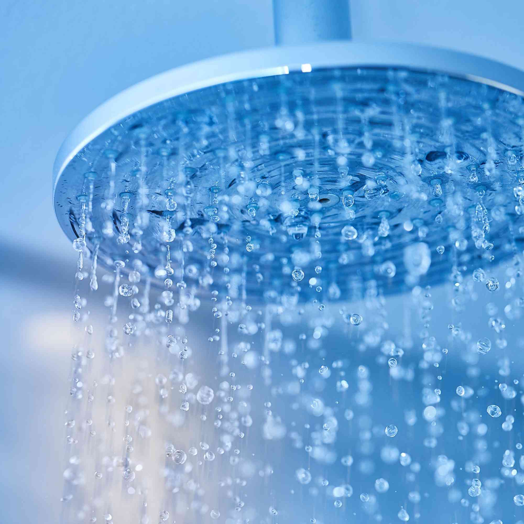 Rain shower head with flowing water
